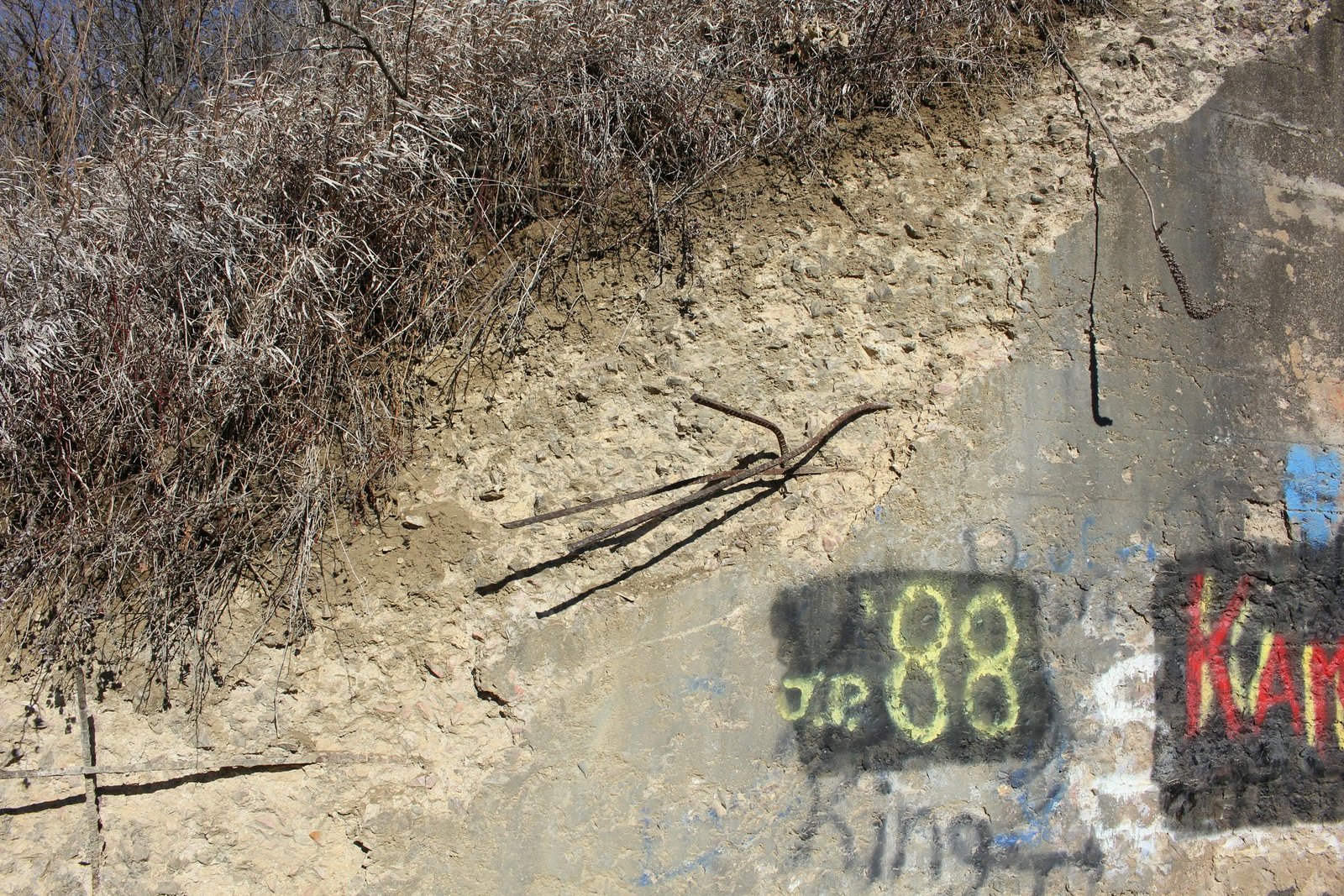 Severe spalling on southwest wing wall